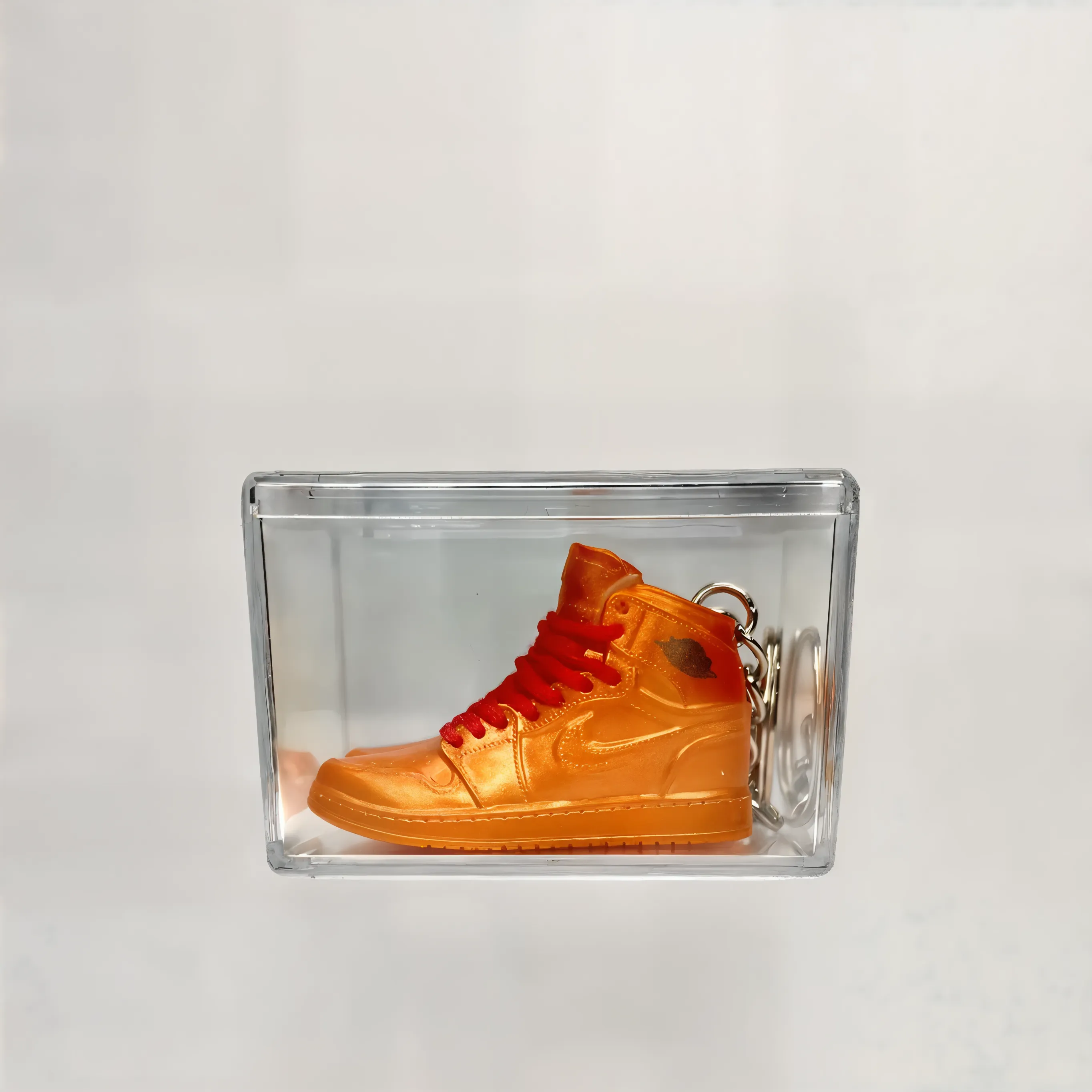 Single MiniSneakers Metallic Orange - Glass Box View